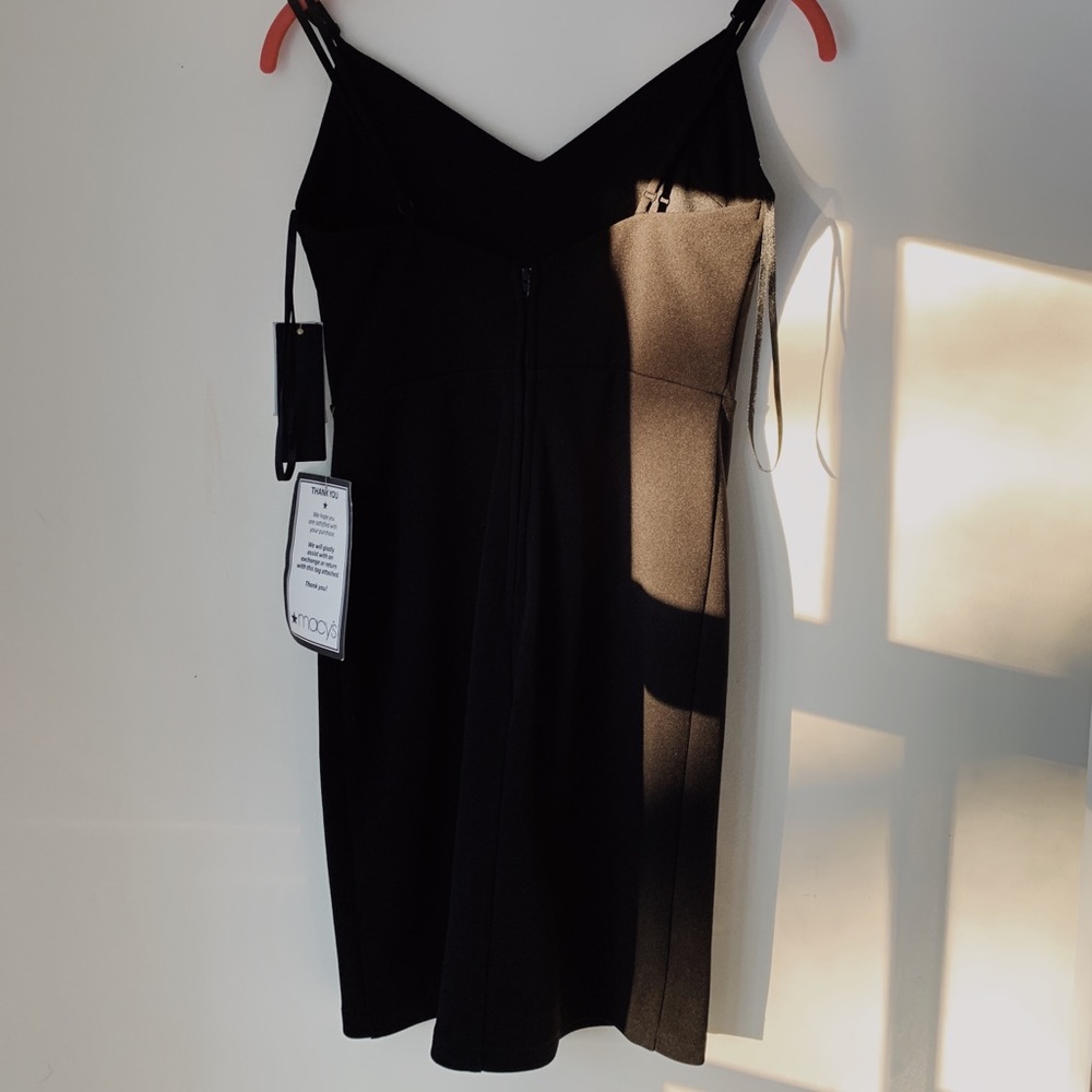 Black v neck dress with silver beads